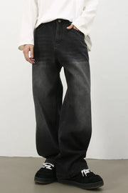 Oversized fade wash denim trousers in dark, wide leg casual jeans.