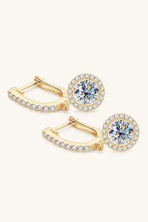 Gold pavé halo drop earrings with a central round-cut stone.