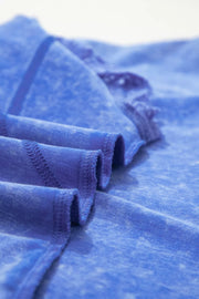 Blue mineral wash cotton tee with lace trim and distressed details