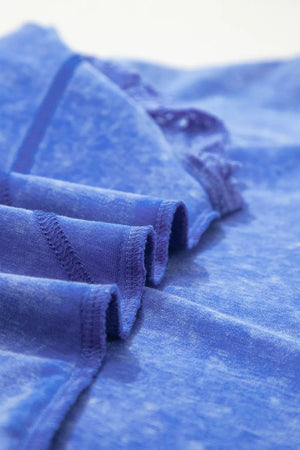 Blue mineral wash cotton tee with lace trim and distressed details