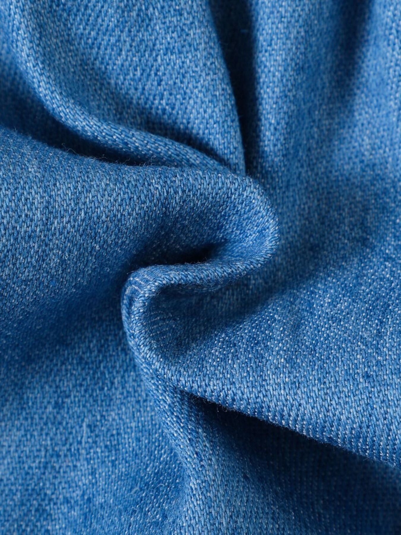 Blue denim fabric texture detail