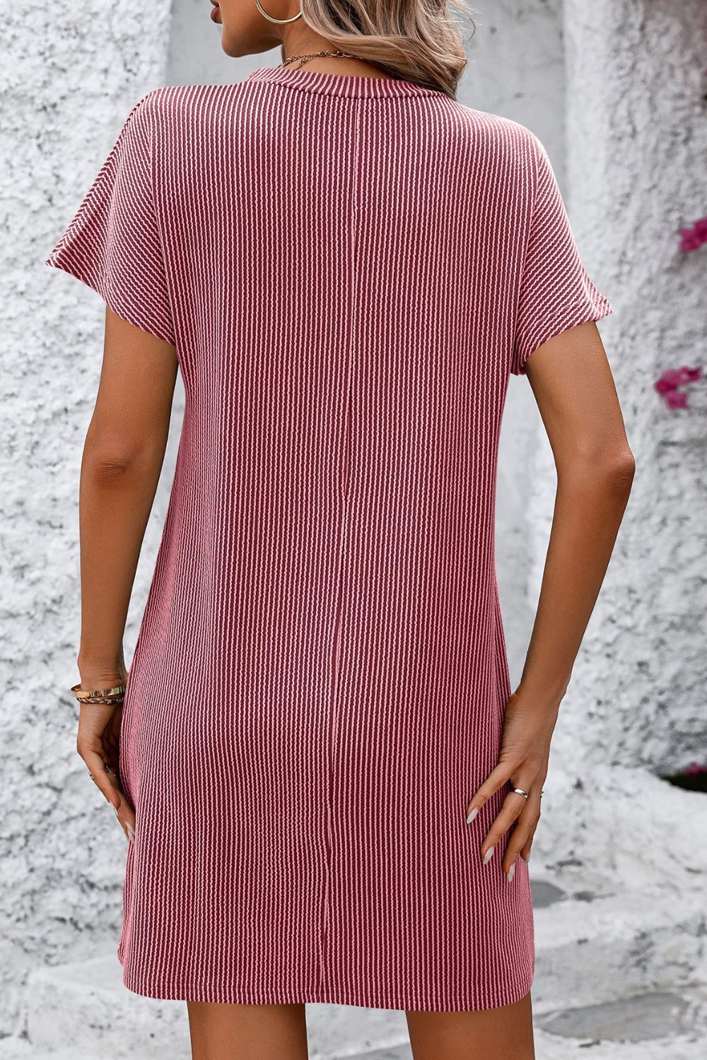 Ribbed tee dress in Deep Rose with vertical stripes, short sleeves, and a casual fit.