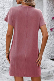 Ribbed tee dress in Deep Rose with vertical stripes, short sleeves, and a casual fit.
