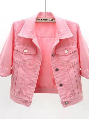 Pink denim cropped sleeve trucker jacket with button pockets and collar