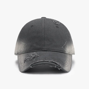 Distressed dark gray denim baseball cap with frayed details.