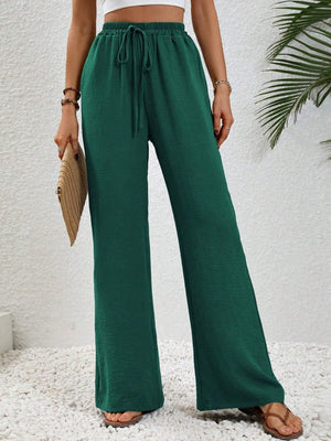 Dark Green textured palazzo trousers with drawstring waist and wide leg