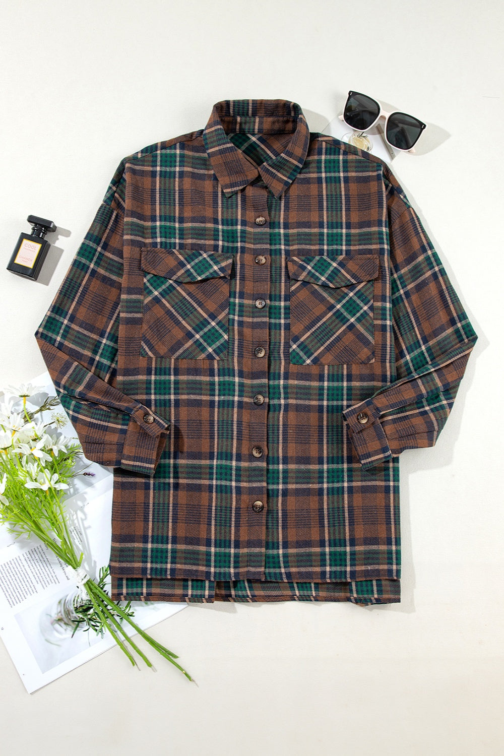 Plaid chic snap jacket in caramel with button front and chest pockets.