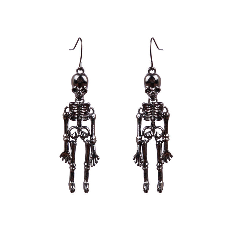 Skeleton silhouette drop earrings in black alloy with articulated bodies.