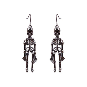 Skeleton silhouette drop earrings in black alloy with articulated bodies.