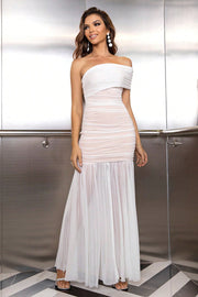 White asymmetric ruched off-the-shoulder maxi dress with sheer skirt.