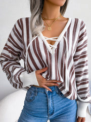 Lace-up stripe knit cropped pullover sweater in taupe and white with V-neck.