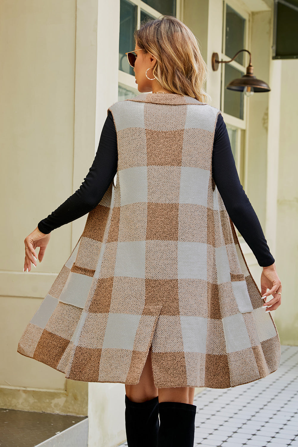 Longline plaid vest in acrylic with collar and pockets, in brown and light grey tones.