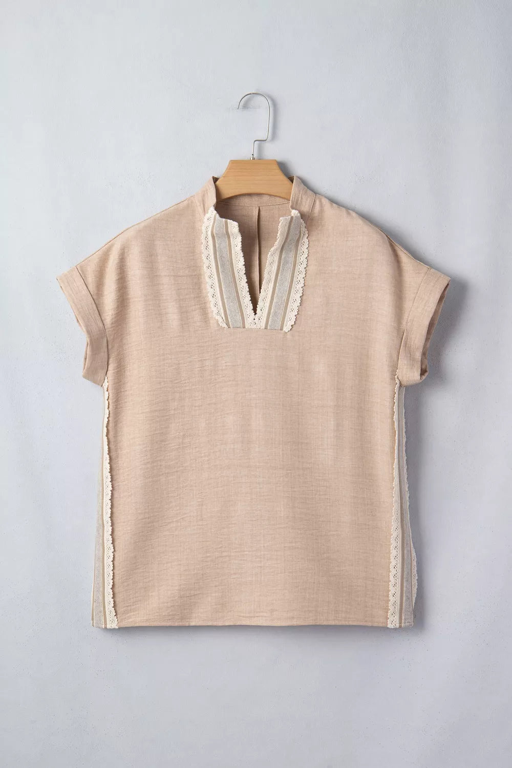Beige crochet lace pullover with rolled sleeves and V-neck detail