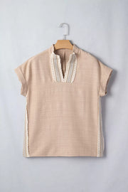 Beige crochet lace pullover with rolled sleeves and V-neck detail