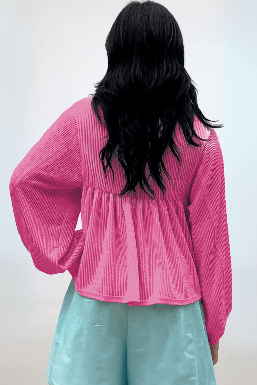 Hot pink textured blouse with gathered yoke and balloon sleeves