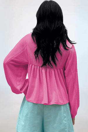Hot pink textured blouse with gathered yoke and balloon sleeves