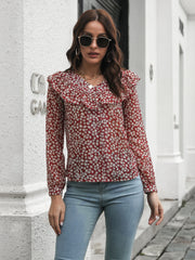 Deep Red floral ruffle trim blouse with V-neck and long sleeves.