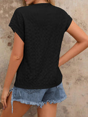 Black woven texture cap-sleeve top with a relaxed fit.