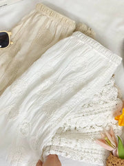 White midi skirt with elastic waist and crochet lace details