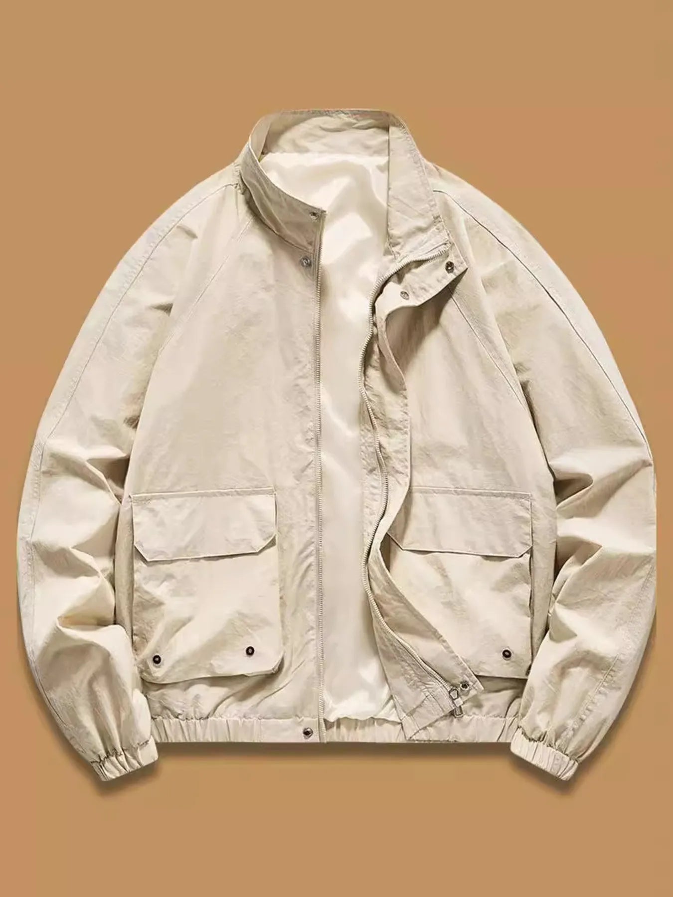 Lightweight men's Khakis zip jacket with stand collar and four front pockets.