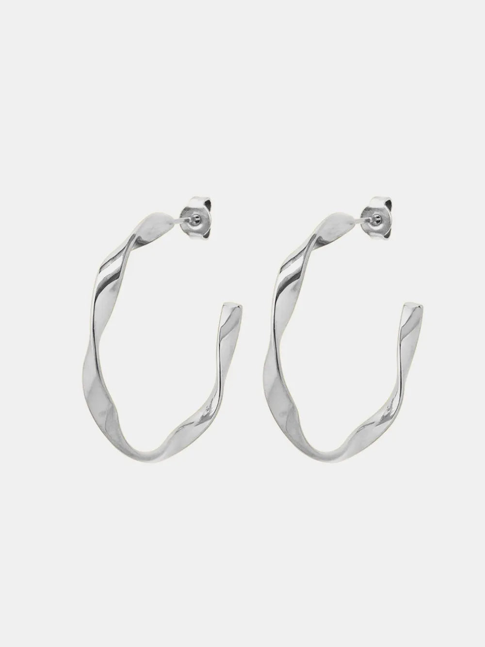 Silver twisted hoop earrings with sculpted detail