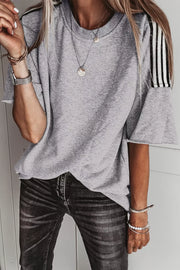 Grey relaxed t-shirt with black and white shoulder stripes, polyester, crew neck, short sleeves.
