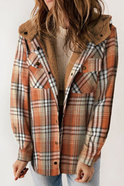 Sherpa-lined plaid overshirt jacket in tangerine with button front and chest pockets.