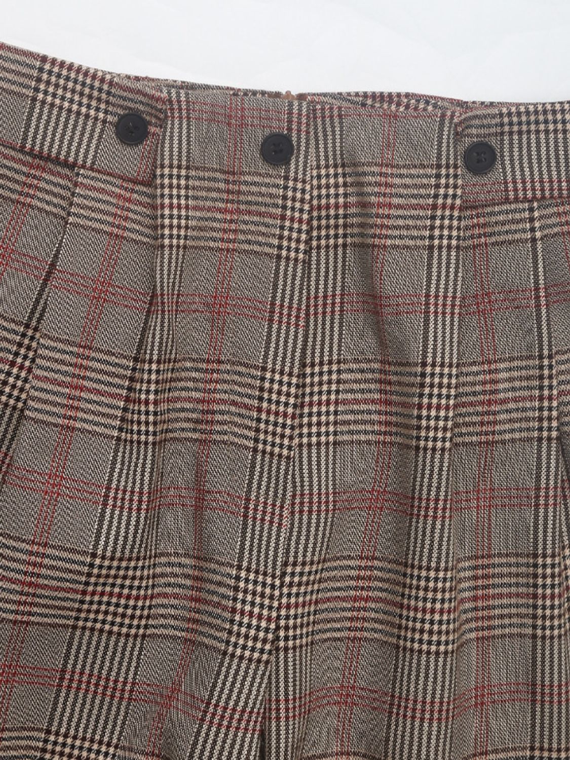 High-waisted plaid trousers in taupe with red and black checks and pleat detail.
