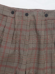 High-waisted plaid trousers in taupe with red and black checks and pleat detail.