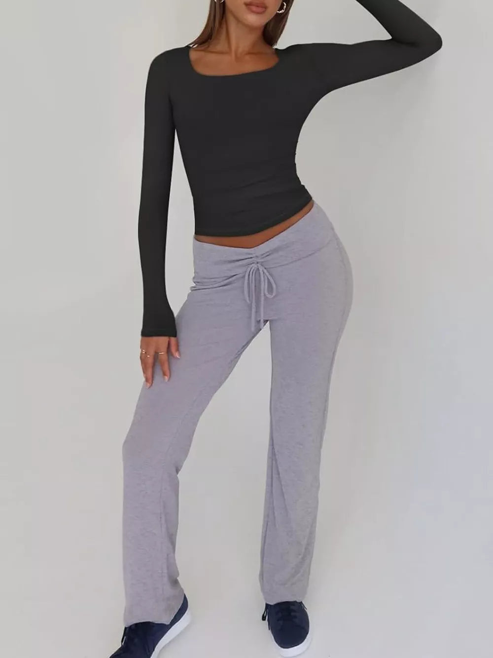 Black long sleeve slim-fit t-shirt with a square neckline.