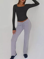 Black long sleeve slim-fit t-shirt with a square neckline.