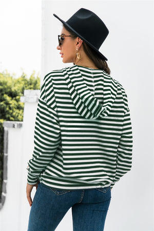 Relaxed fit hoodie in forest green and white stripes with a hood and button neck detail.
