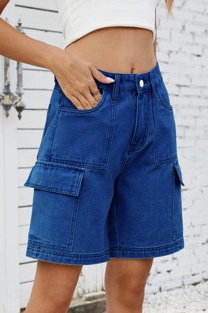 Medium wash denim utility shorts with large cargo pockets and contrast stitching.