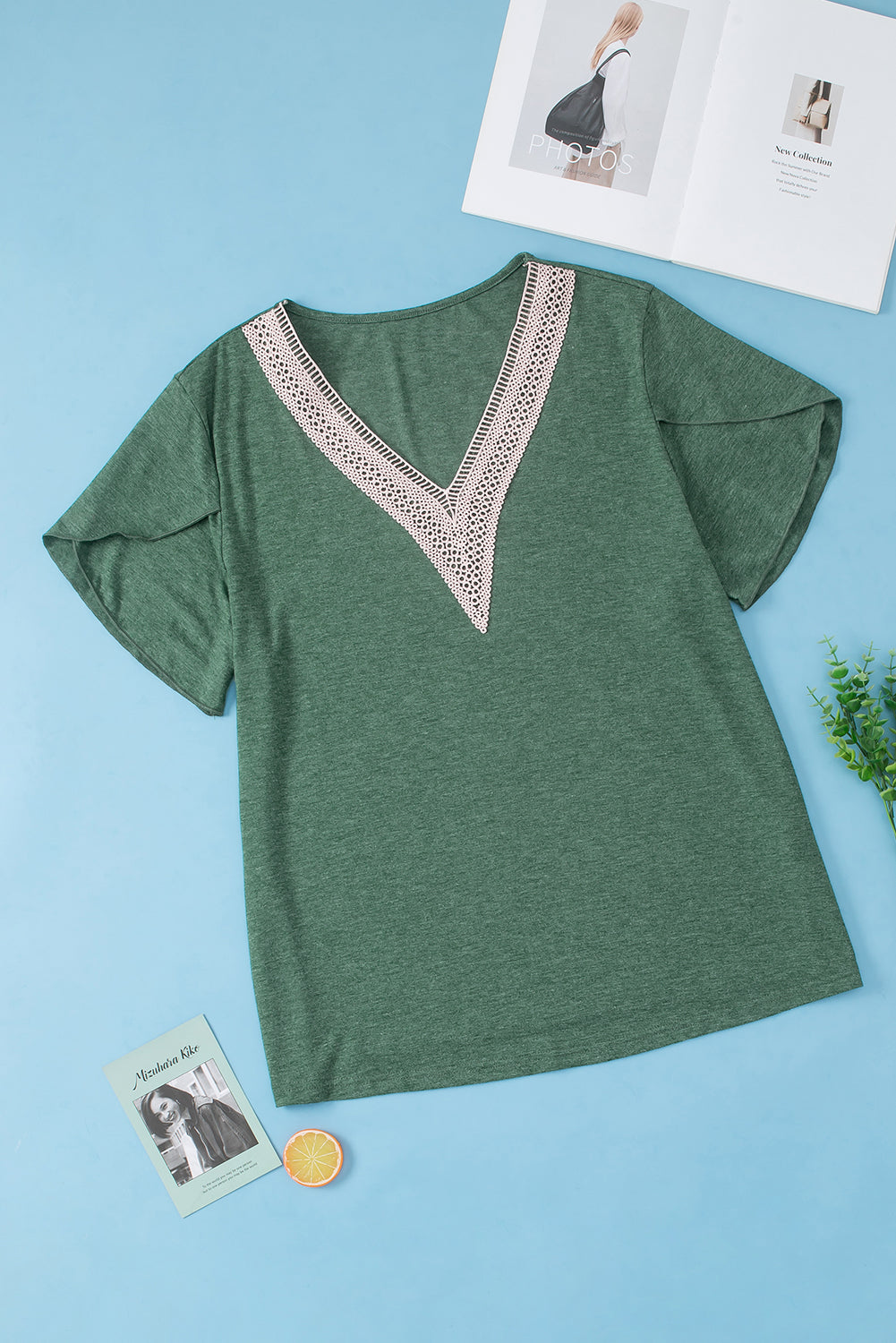 Dark green tee with lace trim V-neck and flutter sleeves