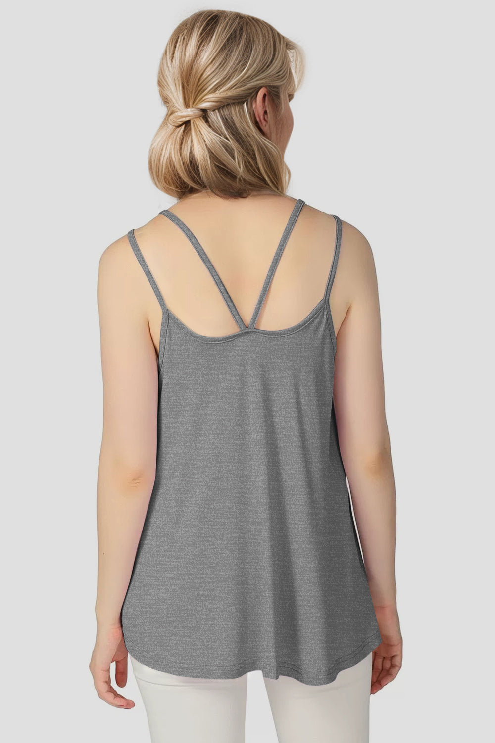 Gray trapeze cami with double spaghetti straps and a rounded hem.
