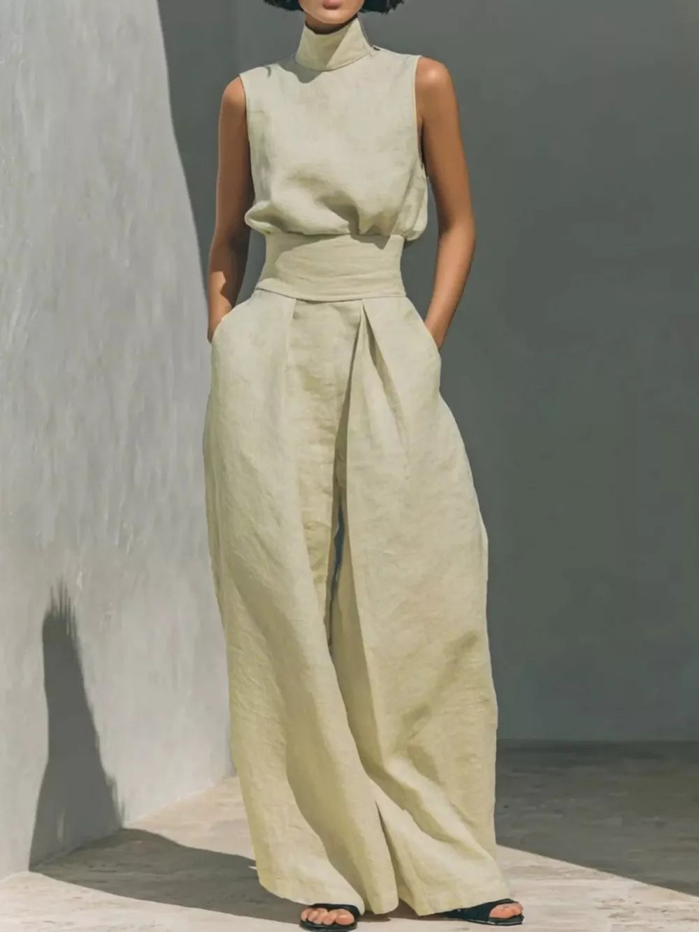 Apricot sleeveless turtleneck and wide-leg pants set with belted waist