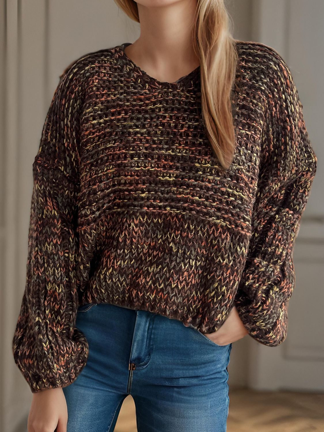 Textured knit sweater in coffee brown with balloon sleeves and a v-neck.