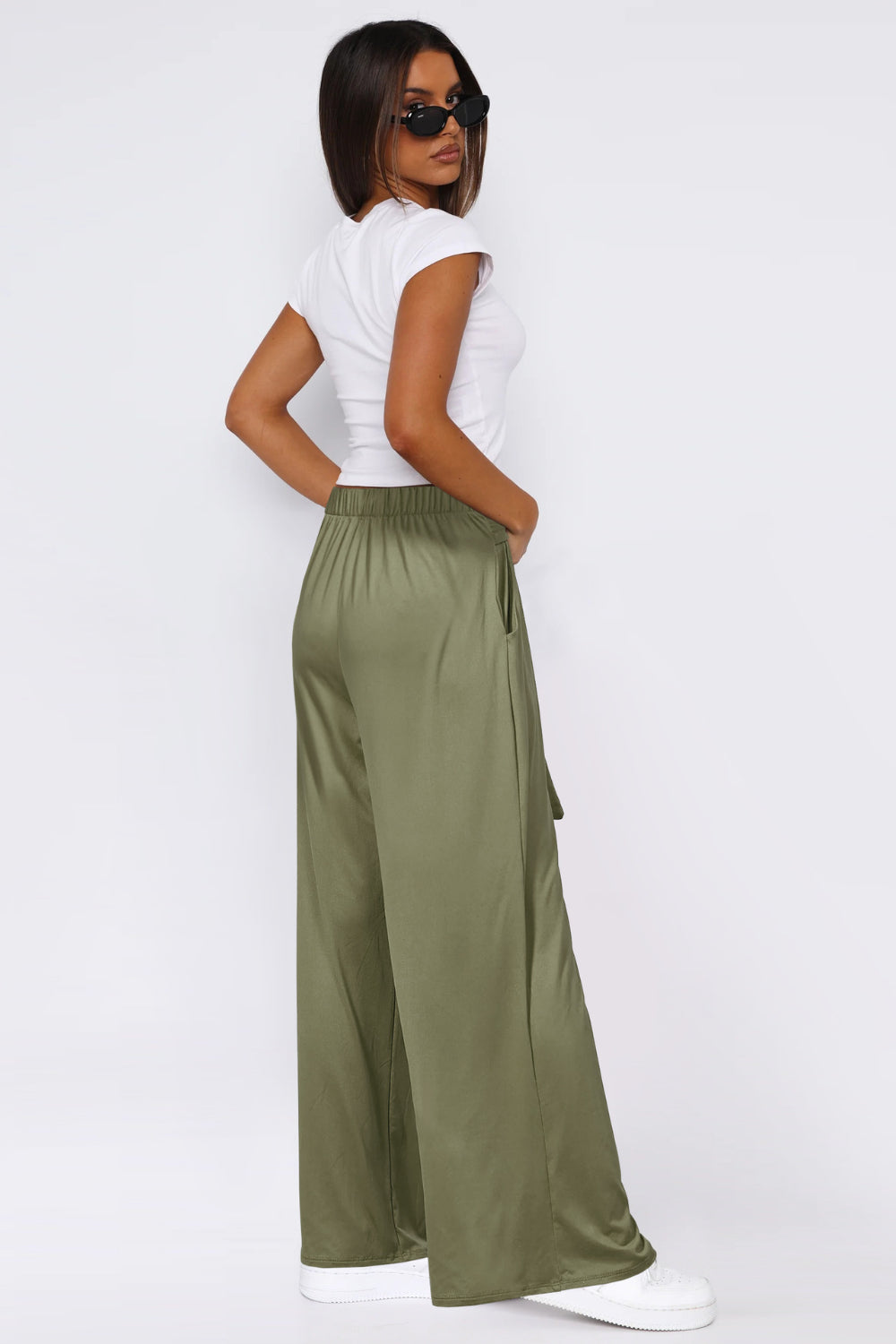 Moss wide-leg flow pants with self-tie belt and elastic waist.
