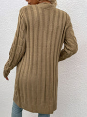 Tan cable knit button-down cardigan with ribbed texture and cable detail on sleeves.