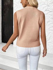 Pink cable knit sweater vest with ribbed hem and neckline.