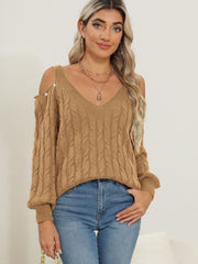 Camel cable knit cold shoulder sweater with button detail and V-neck.