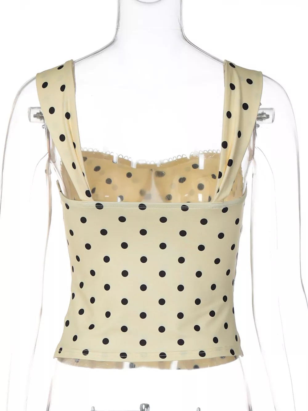 Pastel yellow polka dot tank top with sweetheart neckline and lace trim.