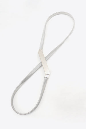 Silver slimline metal waist belt with a rectangular buckle detail