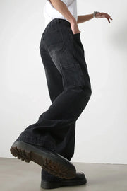 Dark denim wide leg carpenter jeans with utility pockets and a relaxed fit.