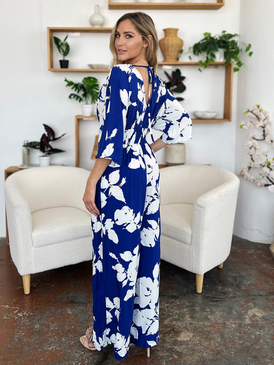 Royal blue floral kimono jumpsuit with wide legs and tie back detail