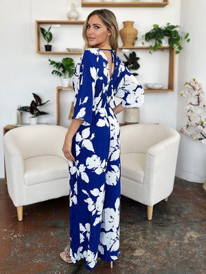 Royal blue floral kimono jumpsuit with wide legs and tie back detail