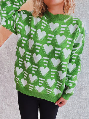 Neon green acrylic knit jumper with allover white geometric heart pattern.