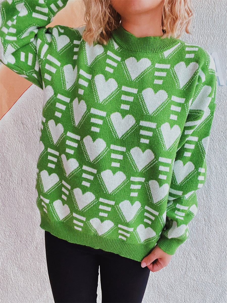 Neon green acrylic knit jumper with allover white geometric heart pattern.