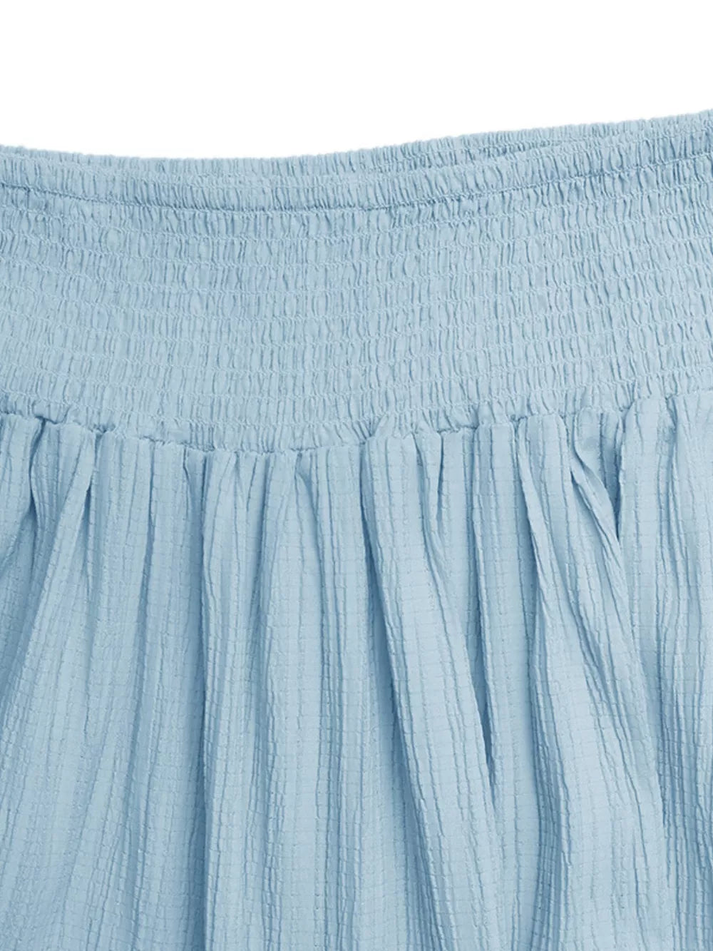 Blue smocked tiered maxi skirt with textured fabric and flowing elegance