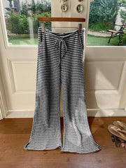 Maternity wide leg pants in black and white stripe with drawstring waist.